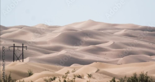 Desert sand dunes distorted in heat wave, arid empty landscape, Arizona America