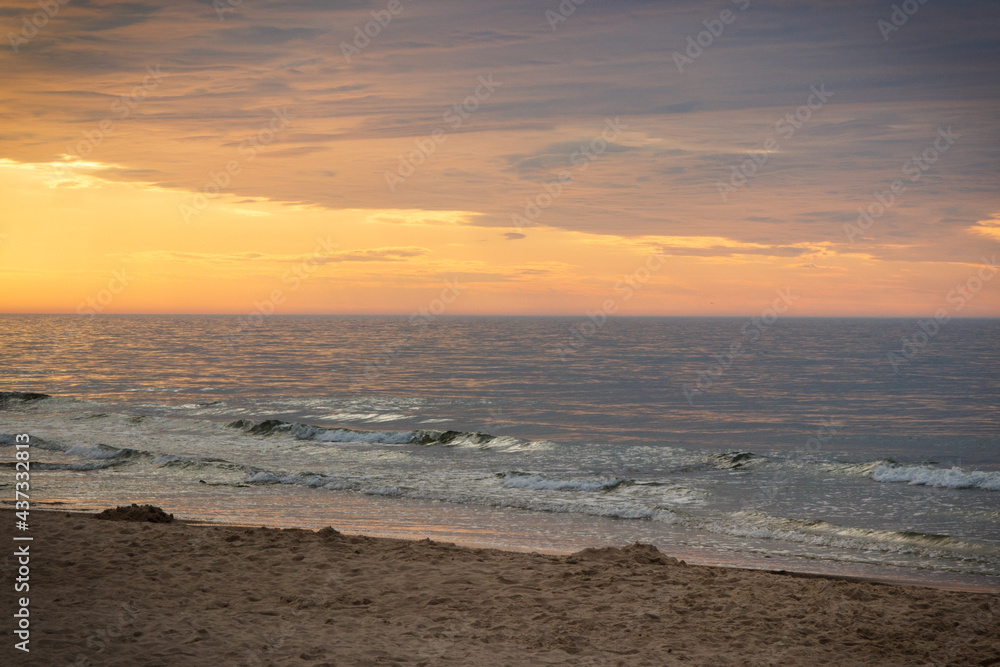 View on landscape of sunset, sea with wave and beach. Travel concept