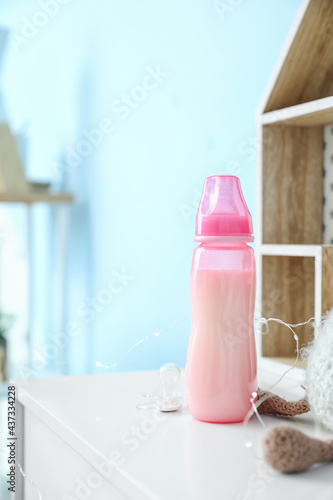 Bottle of milk for baby on ...