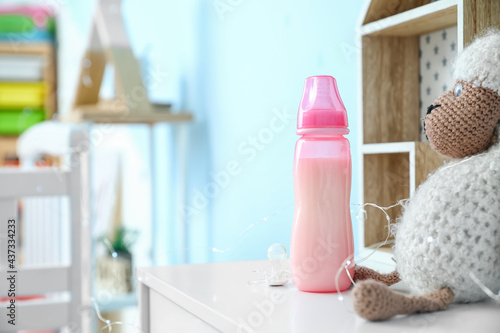 Bottle of milk for baby on ...