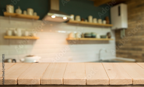 Blurred kitchen interior and napkin and desk space