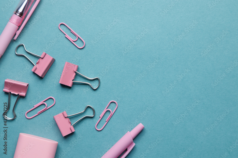 Flatley on a school theme with pencils and pens, paper clips and stickers. Flat layout with a blank blue background. Flatley on a school theme with pencils and pens, paper clips and stickers. Flat layout with a blank blue background.