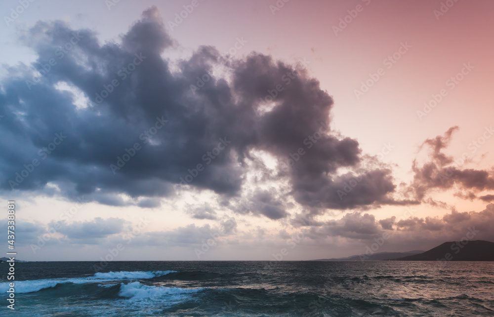 Stormy Sea is under dramatic cloudy sky
