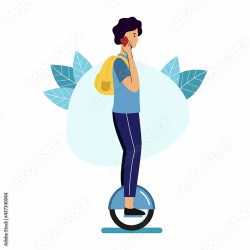 Man with backpack rides on monowheel and talks on  phone. Walk around  city on  mono wheel.