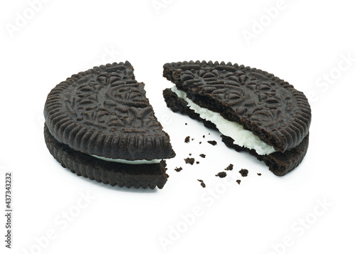 Stuffed cookies and cream flavor, Broken piece with crumbs, Tasty sweet snack, Isolated on white background