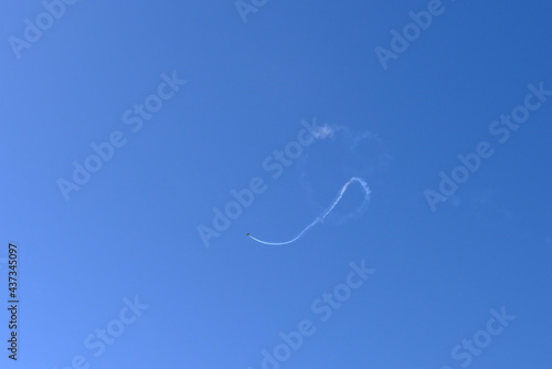 lettering airplane in the blue sky