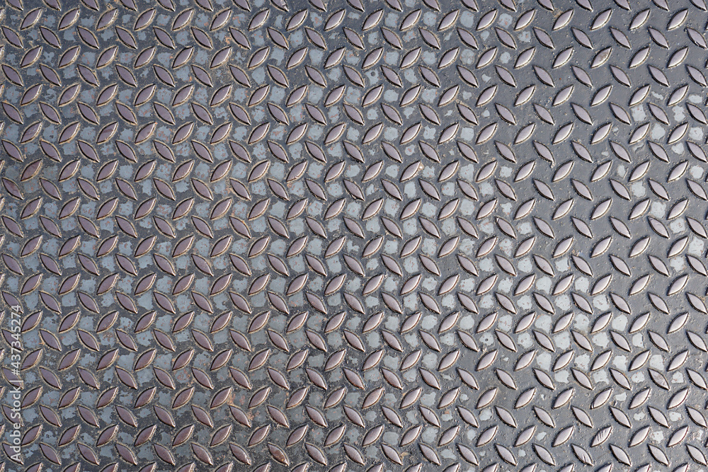 Pattern of old metal diamond plate, Surface of black steel floor non-skid with dirty stain, Texture background Pattern of old metal diamond plate, Surface of black steel floor non-skid with dirty stain, Texture background