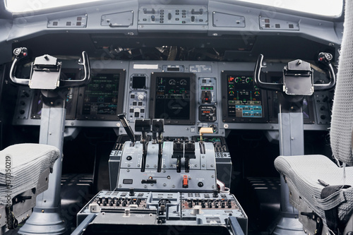 Knobs and buttons. Close up focused view of airplane cockpit