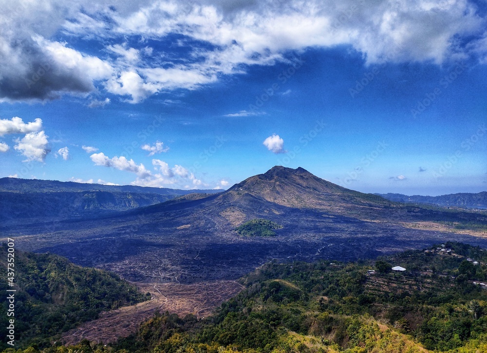 kintamani volcano view with clouds and mountains at bali indonesia