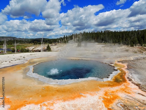 crested pool hot spring and orange microbial mat in the old faithful geyser basin of yellowstone national park, wyoming