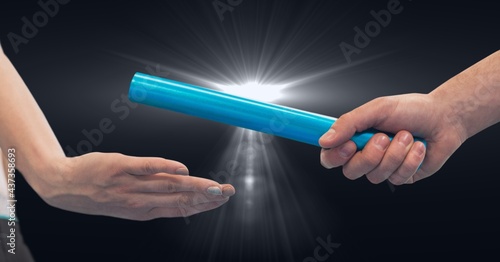 Composition of caucasian male runner passing baton to his teammate on black background