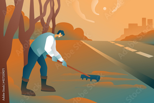 A man in uniform cleans the area with a rake, cleaning leaves on the territory. Worker guy with equipment on the background of an abstract city and trees. The concept of urban improvement.
