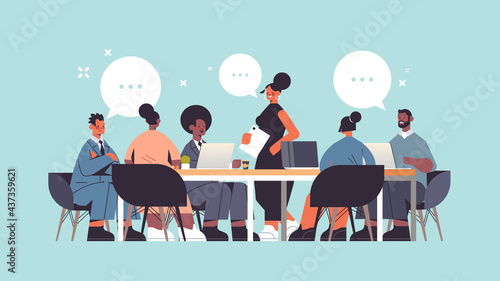 businesswoman leader discussing with mix race businesspeople group during conference meeting