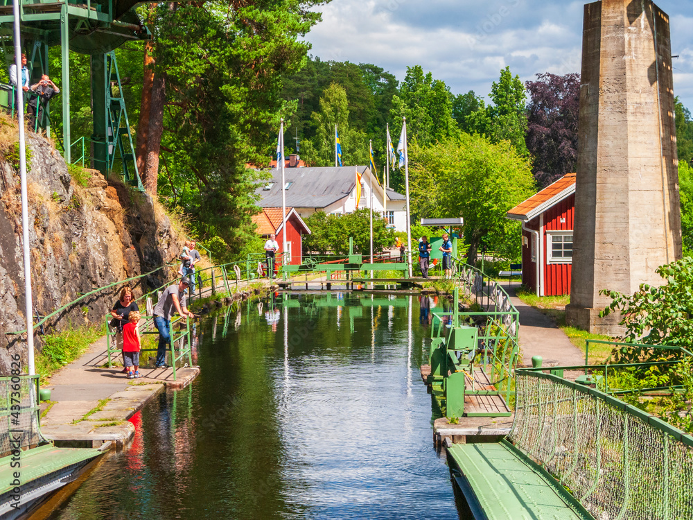 Locks in Haverud in Sweden with people watching