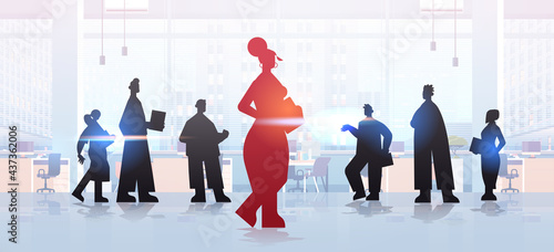 red businesswoman leader silhouette standing in front of businesspeople group leadership business competition