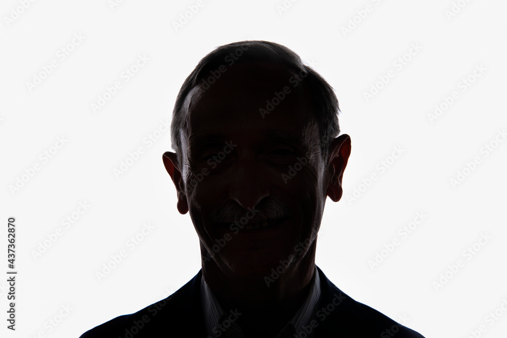 Male silhouette. black-and-white silhouette of head of caucasian businessman on a white isolated background Male silhouette. black-and-white silhouette of head of caucasian businessman on a white isolated background