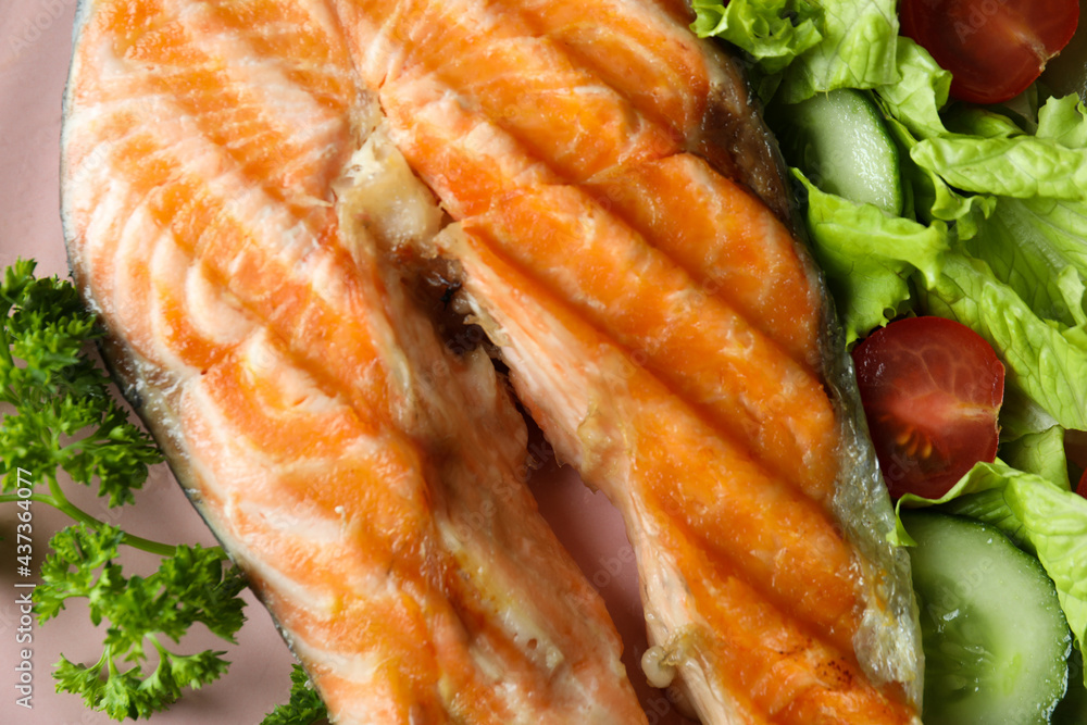 Tasty grilled salmon and ingredients, close up Tasty grilled salmon and ingredients, close up