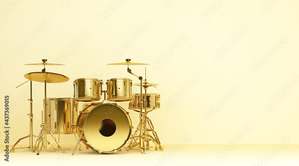 gold drum kit on yellow wall