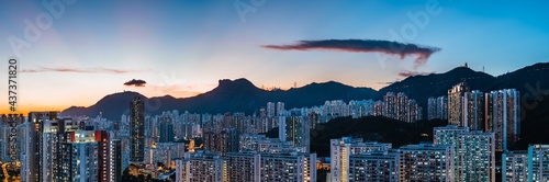 Panorama of sunset in Hong Kong City skyline and Lion Rock Hill
