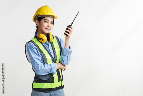 beautiful asian woman engineer and safety helmet on white background, construction concept, Engineer, Industry. © kitthanes