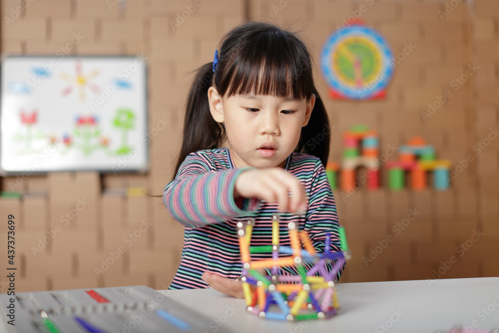 Young Girl Playing Creative 3D Shape Toy For Homeschooling Young Girl Playing Creative 3D Shape Toy For Homeschooling