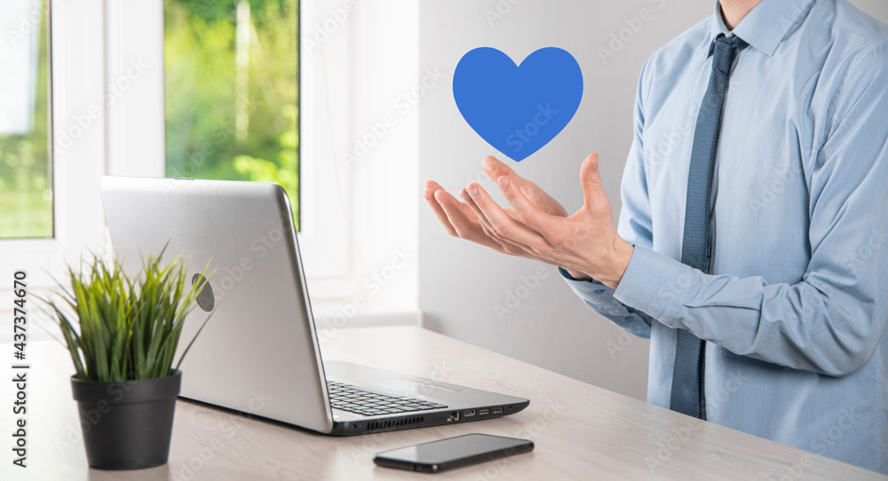 Businessman in shirt holding heart like icon symbol Businessman in shirt holding heart like icon symbol