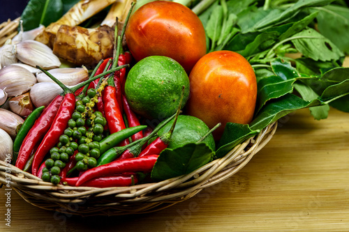 The variety of spices in a wicker basket