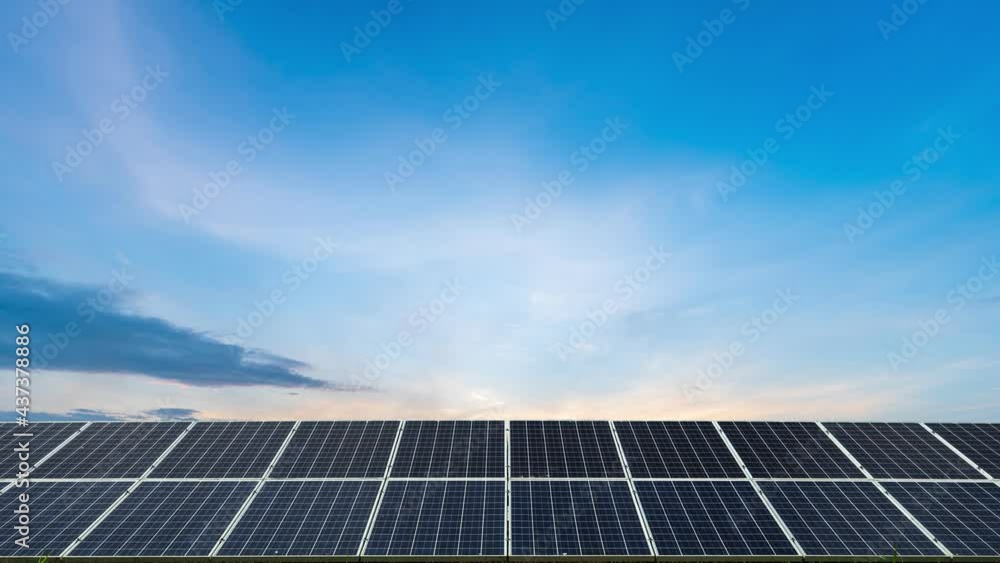 4K Time lapse of photovoltaic solar power panel industrial cell on dramatic sunset sky background,clean Alternative power energy concept. 4K Time lapse of photovoltaic solar power panel industrial cell on dramatic sunset sky background,clean Alternative power energy concept.