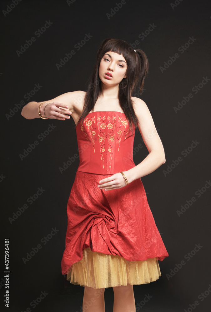 Portrait of beautiful young woman posing. doll