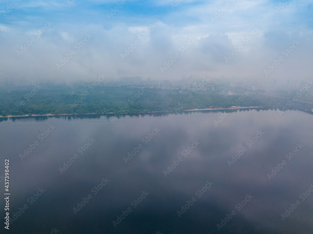 Dnieper River in Kiev. Spring cloudy morning. Aerial drone view.