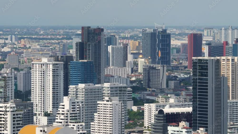 Crowded of build cityscape district. Perspective sky background. Investment, finance and business concept. City panorama. Top view capital Bangkok, Thailand Crowded of build cityscape district. Perspective sky background. Investment, finance and business concept. City panorama. Top view capital Bangkok, Thailand