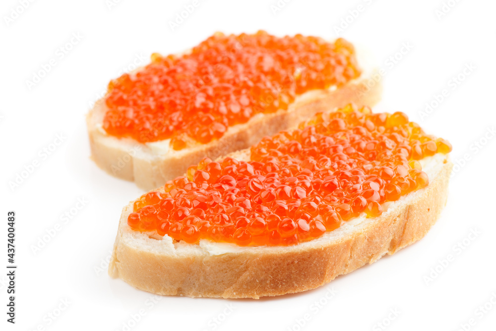 Two loaves of bread with red salmon roe isolated on white
