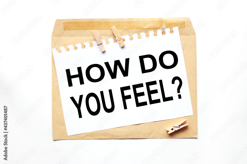 how do you feel.text on white paper on craft notebook how do you feel.text on white paper on craft notebook