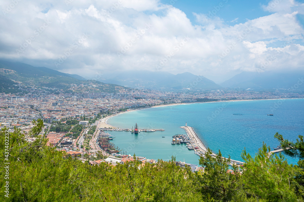 The scenic view of Red Tower and Alanya Marina from Alanya Castle.