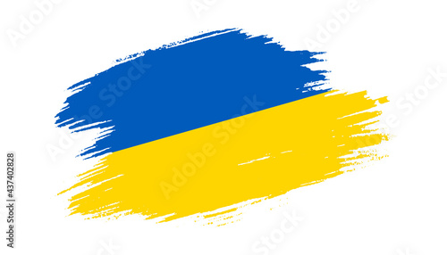 Fotografiet Patriotic of Ukraine flag in brush stroke effect on white background