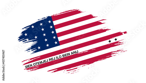 Patriotic of Bikini Atoll flag in brush stroke effect on white background photo