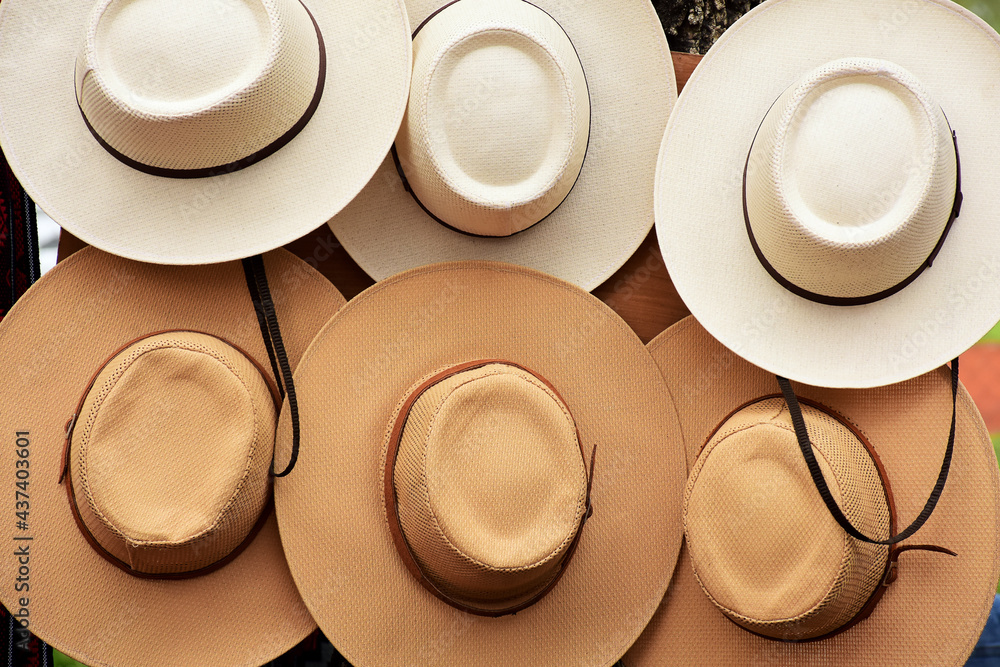 top view of various classic white and brown hats, headgear accessories