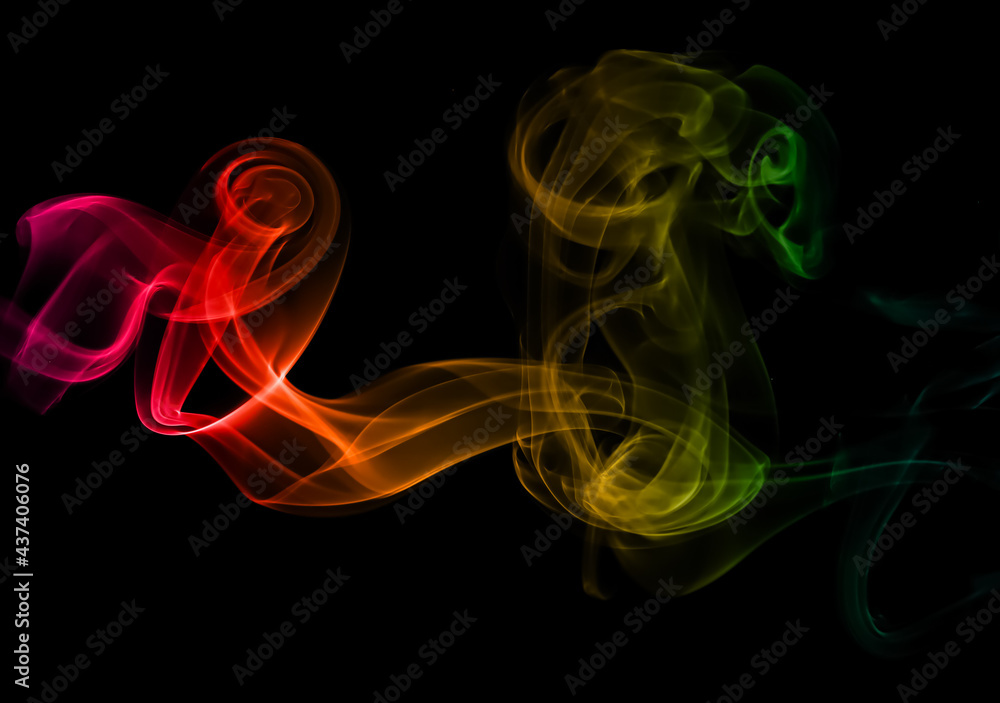 Obraz premium colorful smoke isolated black background