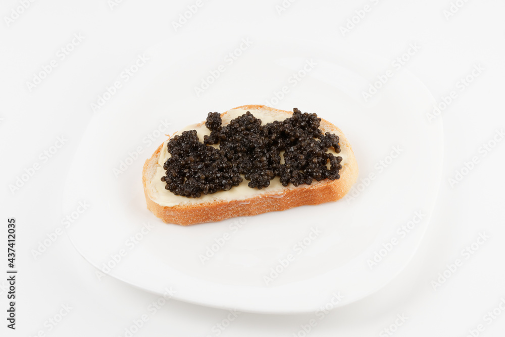 Real, not imitated, beluga caviar on plate, isolated Real, not imitated, beluga caviar on plate, isolated