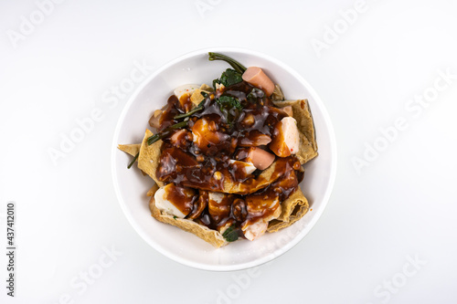 "Yong Tau Foo" is a type of Hakka Chinese soup dish commonly found in Singapore and Malaysia.