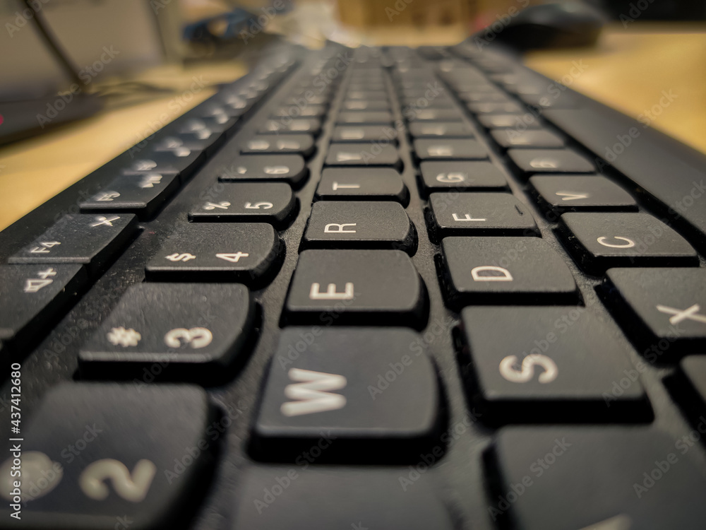 An image of a keyboard. Selective focus image.