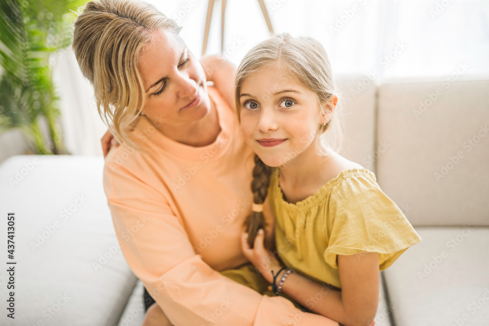 Cute child girl with his young mother at home Cute child girl with his young mother at home