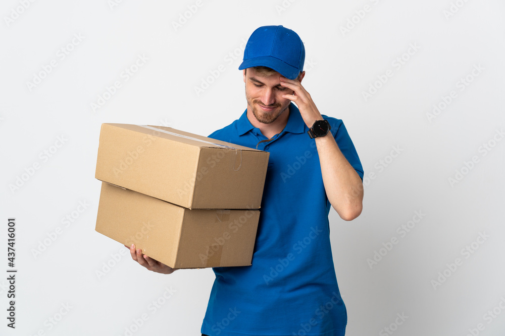 Young delivery blonde man isolated on white background laughing Young delivery blonde man isolated on white background laughing