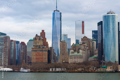 Freedom Tower rising over The Battery and other buildings in Lower Manhattan, New York City