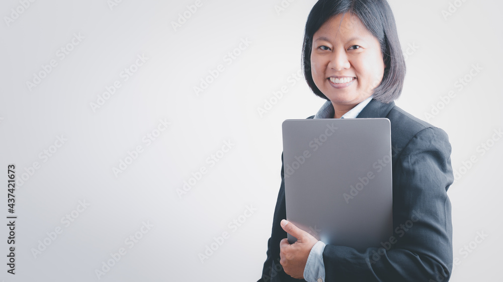 Business woman concept, business woman or student holding laptop computer and looking at camera on isolated over white background, Portrait business woman happy smiling holding laptop computer. Business woman concept, business woman or student holding laptop computer and looking at camera on isolated over white background, Portrait business woman happy smiling holding laptop computer.