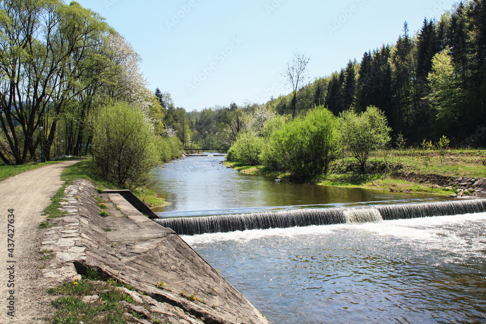 WISLA, POLAND - MAY 28, 2021: Wisla river in the city with the same name. WISLA, POLAND - MAY 28, 2021: Wisla river in the city with the same name.