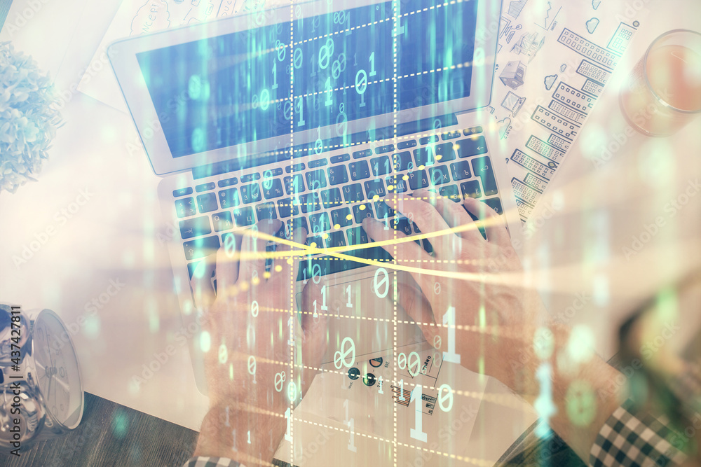 Multi exposure of man's hands typing over computer keyboard and data theme hologram drawing. Top view. Technology concept. Multi exposure of man's hands typing over computer keyboard and data theme hologram drawing. Top view. Technology concept.