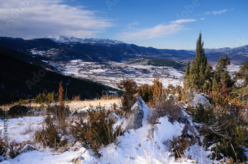 Cerdanya valley and Serra de Cadí range on a winter day after a snowfall (Cerdanya, Catalonia, Spain, Pyrenees)