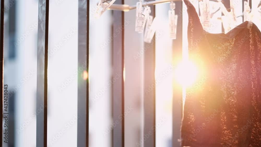 Hang a small cloth On the condominium balcony With sunlight shining on the cloth until it dries 4k Hang a small cloth On the condominium balcony With sunlight shining on the cloth until it dries 4k