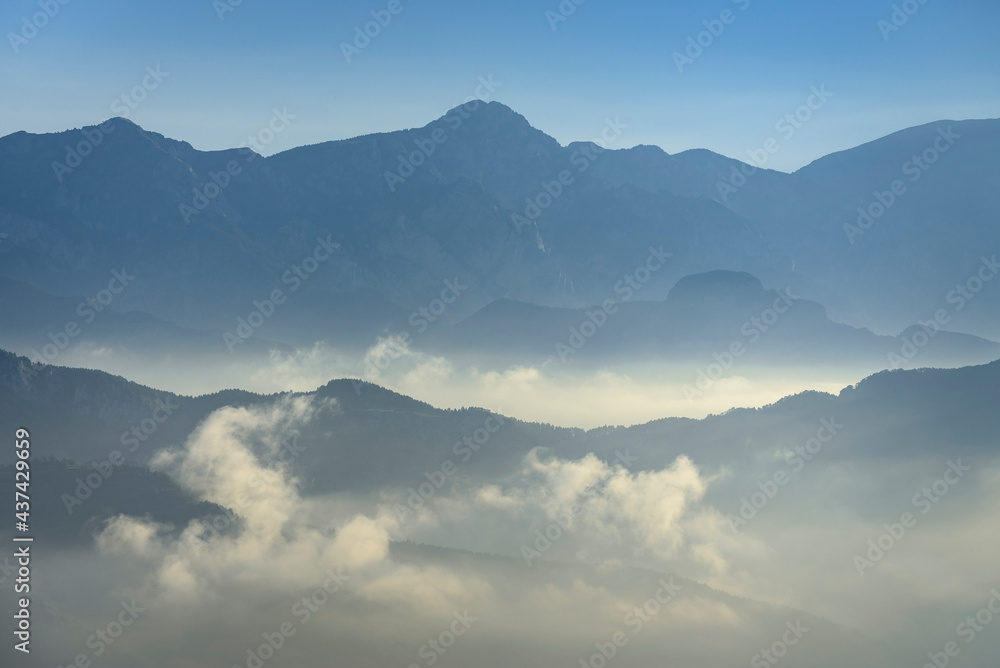 Moixeró mountain in a summer morning with low clouds over the Saldes Valley (Berguedà, Catalonia, Spain, Pyrenees)